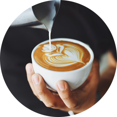 A latte poured at Genika Cafe